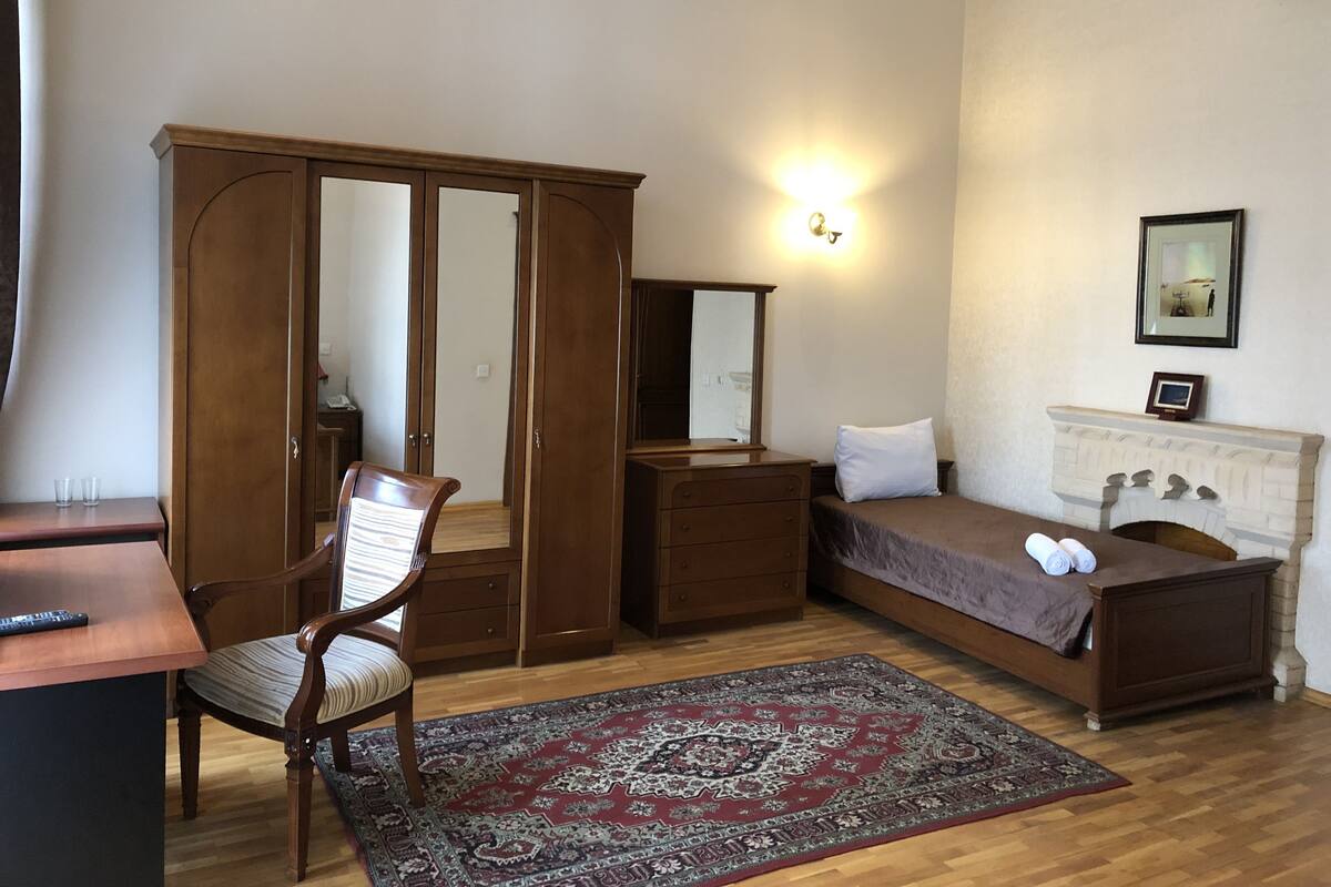 Standard Quadruple Room, Mixed Dorm, Non Smoking | Minibar, in-room safe, desk, iron/ironing board