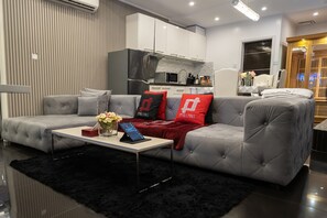 Luxury Loft, 2 Bedrooms, Private Pool | Living area | 49-inch LED TV with digital channels, TV, tablet - Luks Lofts Hotel & Residences (Batangas City)