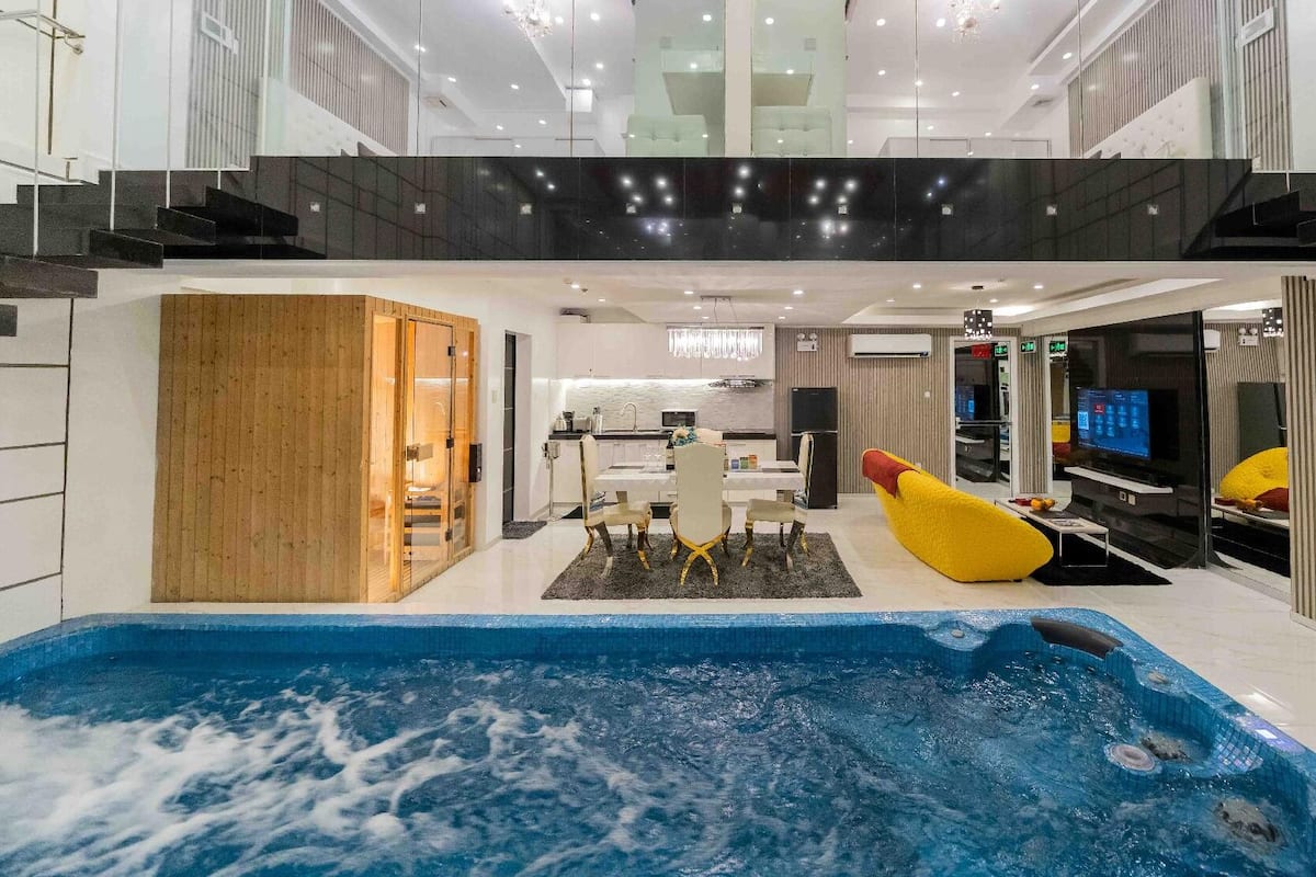 Suite Deluxe, 2 chambres, piscine privée | Coin séjour