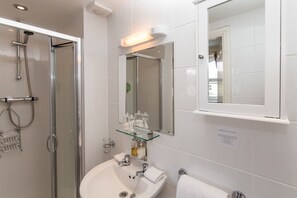 Shower, free toiletries, hair dryer, towels