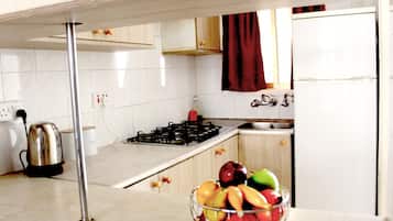 Fridge, stovetop, electric kettle, highchair