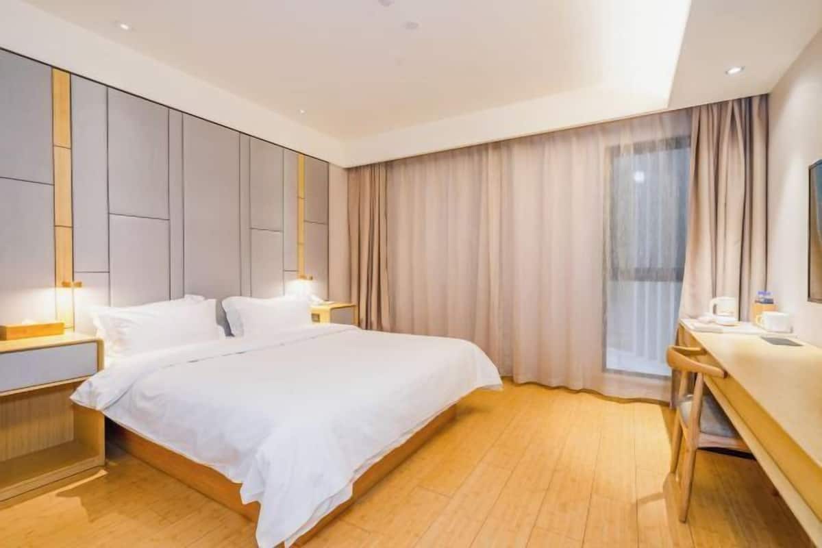 Premium bedding, down comforters, pillowtop beds, minibar