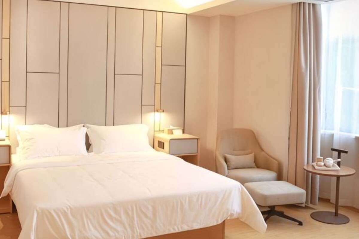 Luxe beddengoed, donsdekens, pillowtop-bedden, een minibar