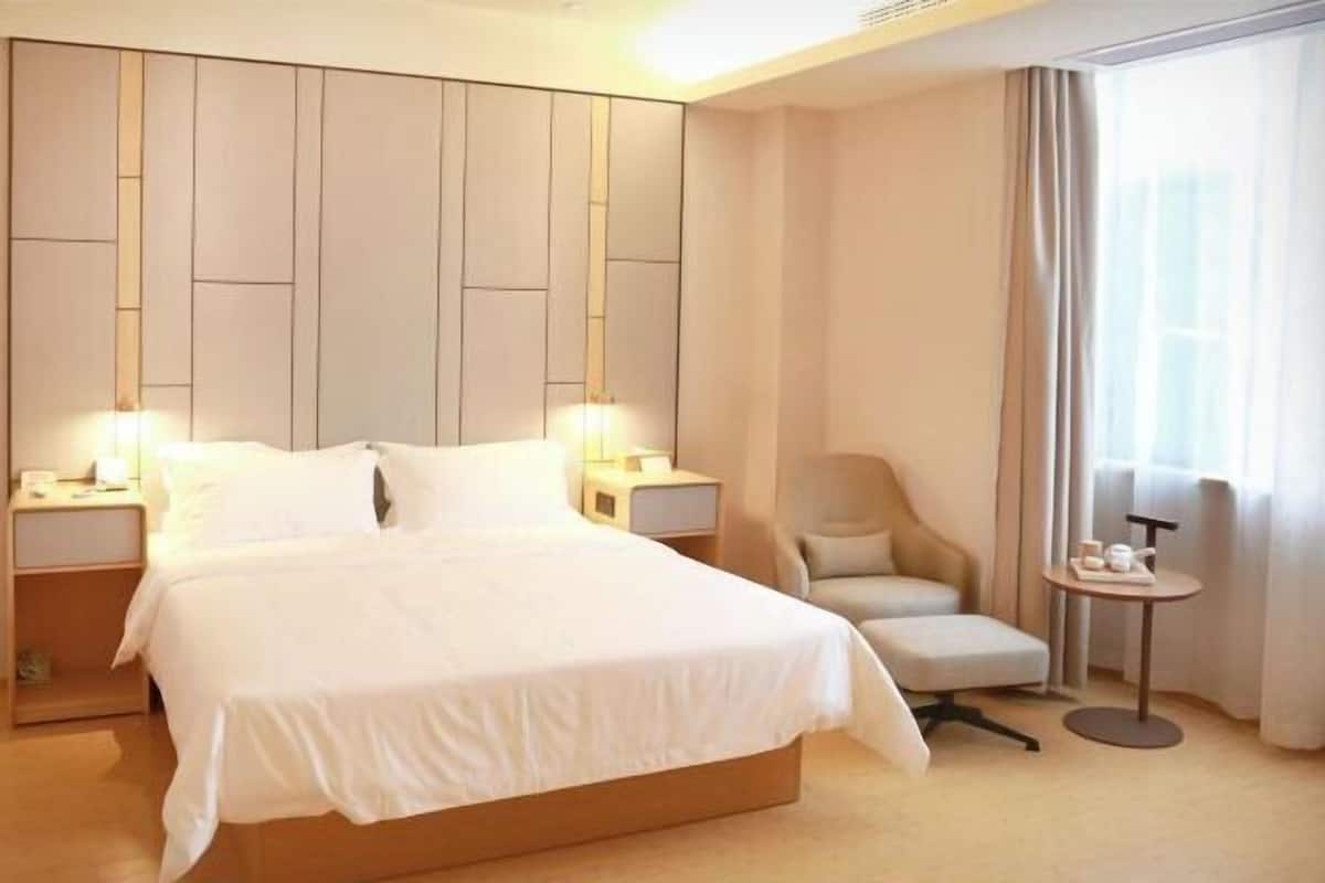 Premium bedding, down comforters, pillowtop beds, minibar