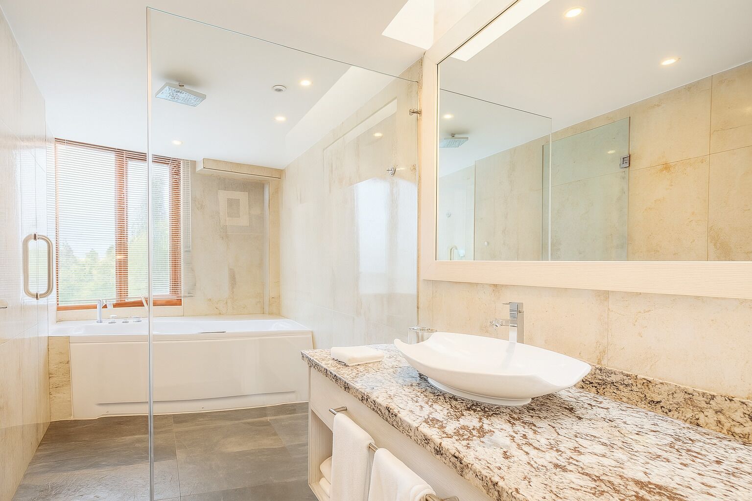junior suite | bathroom | shower, rainfall showerhead, free toiletries, hair dryer