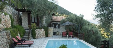 Outdoor pool, pool umbrellas, pool loungers