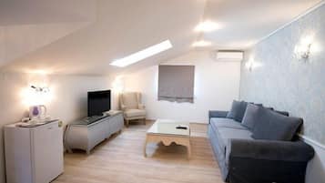 Superior Suite | Living area | Smart TV