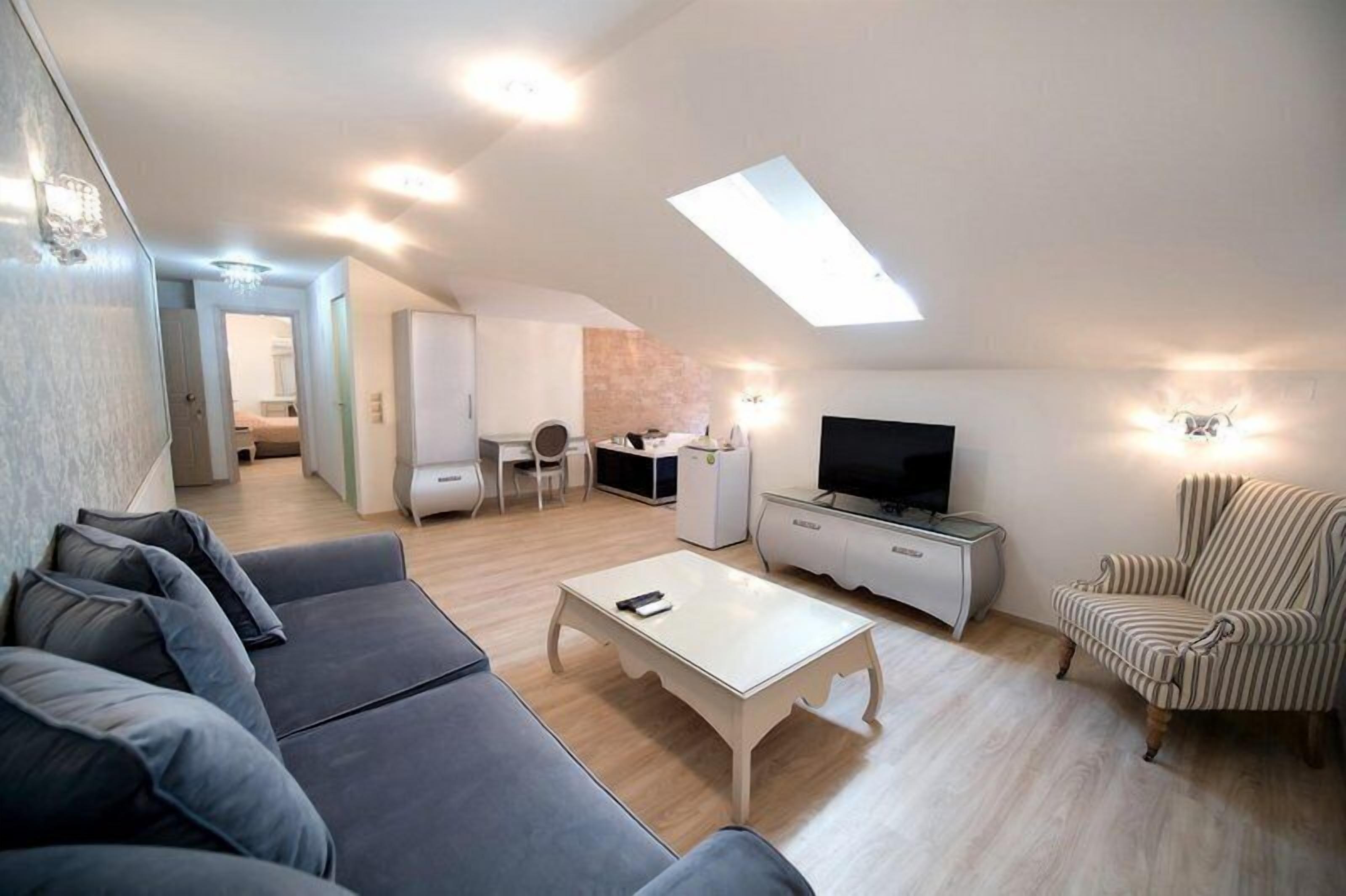 superior suite | living area | smart tv