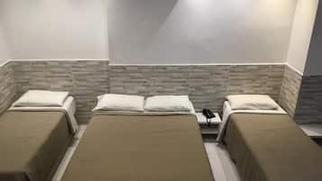 Quadruple Room, Sea Facing | Minibar, desk, free WiFi, bed sheets