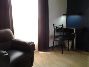 Triple Room, Shared Bathroom, Mountain View | In-room safe, desk, iron/ironing board, free cots/infant beds