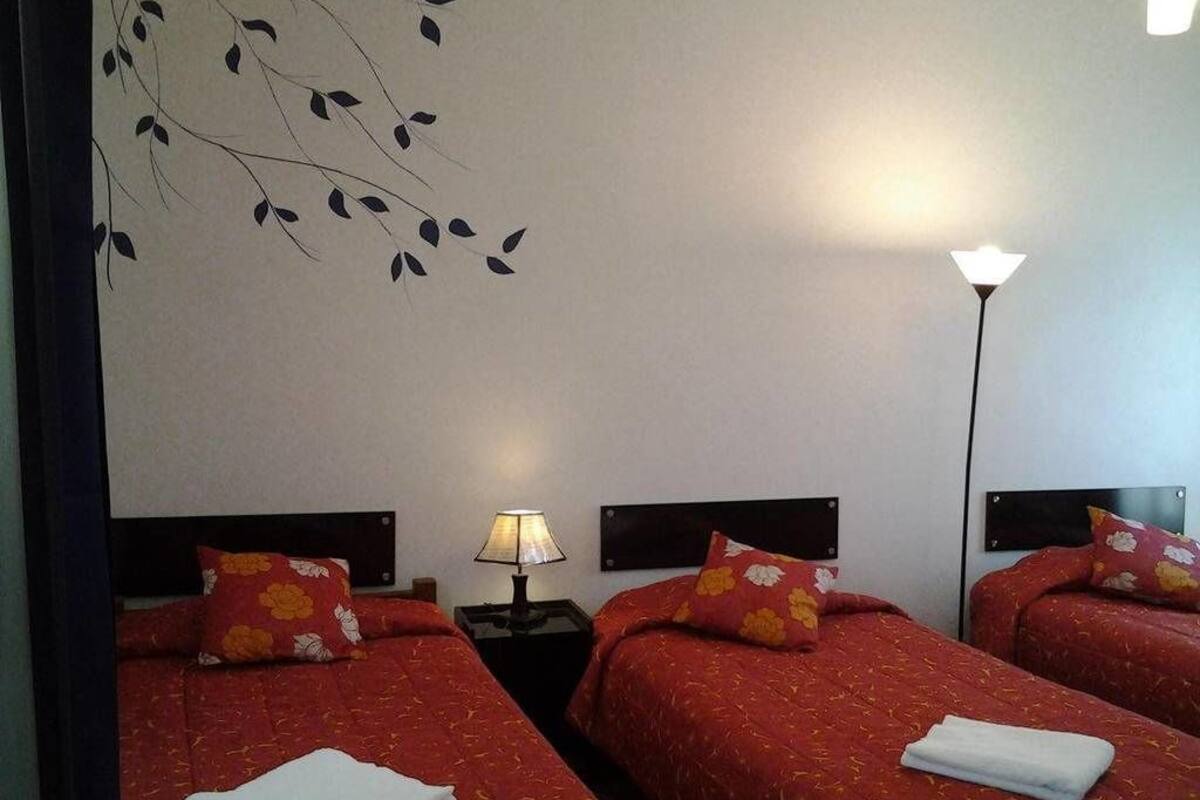 Triple Room, Shared Bathroom, Mountain View | In-room safe, desk, iron/ironing board, free cots/infant beds