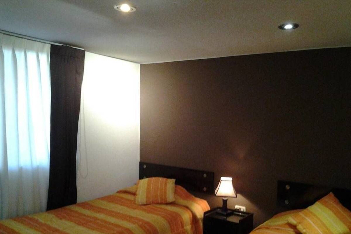Twin Room, Balcony, Mountain View | In-room safe, desk, iron/ironing board, free cots/infant beds