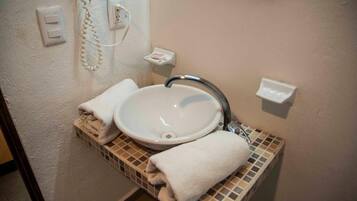 Shower, free toiletries, hair dryer, towels