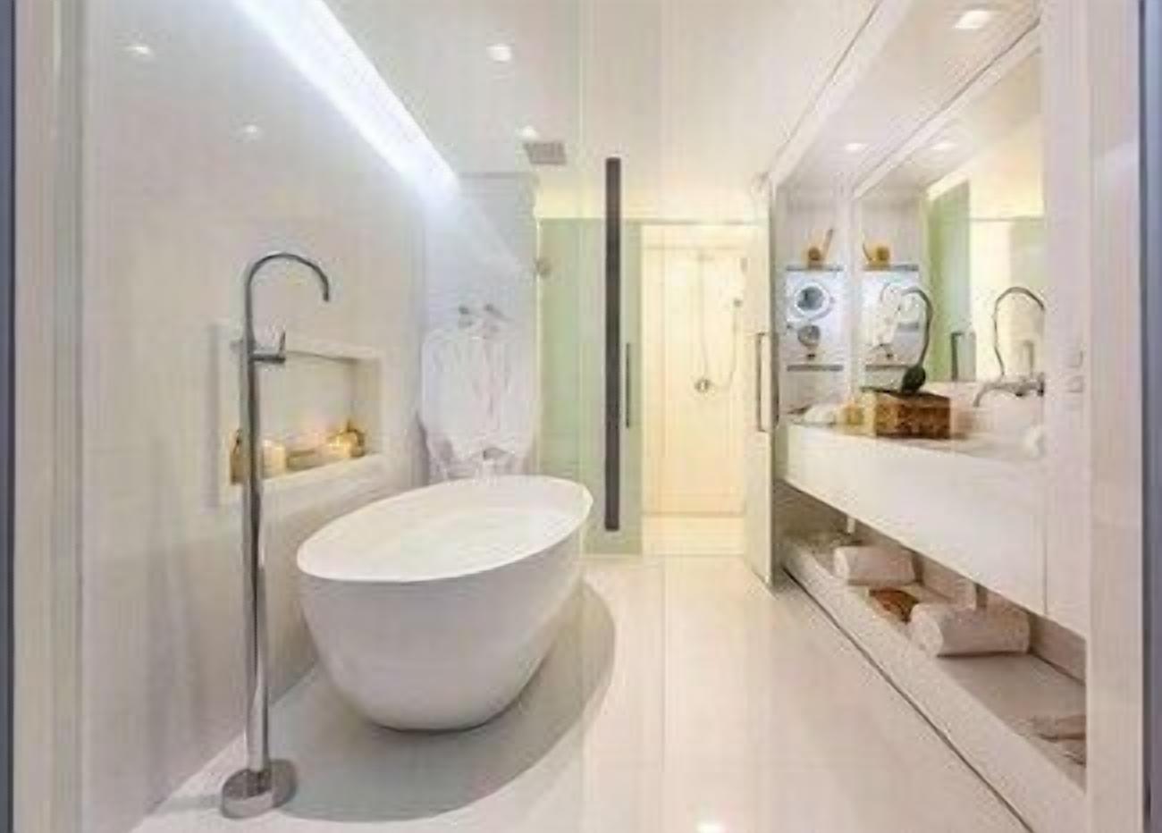 Bathroom | Designer toiletries, hair dryer, towels, soap