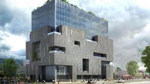 A modern building with a glass facade, multiple balconies, and a rooftop garden. - J Square Hotel (Jinju)