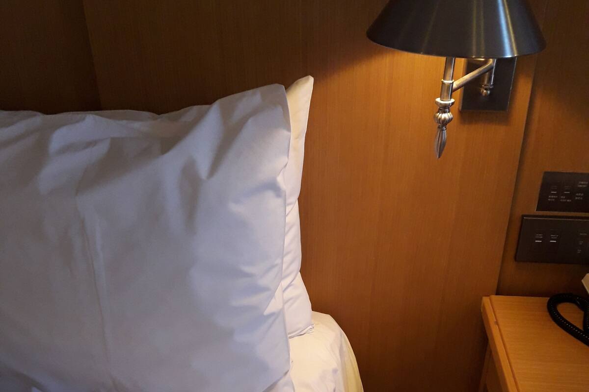 Premium bedding, down comforters, desk, laptop workspace