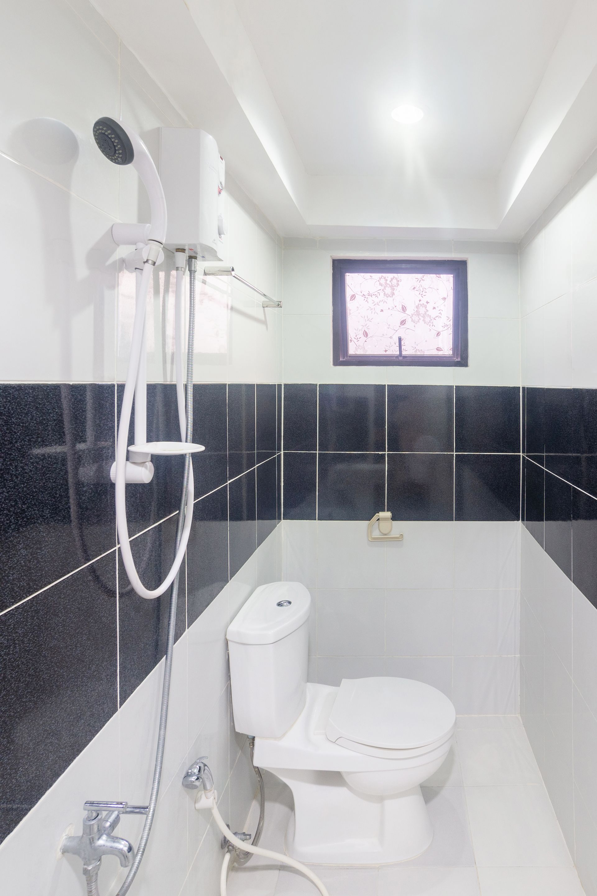 Deluxe Triple Room | Bilik Mandi | Pancuran mandi, bidet, tuala disediakan, sabun 