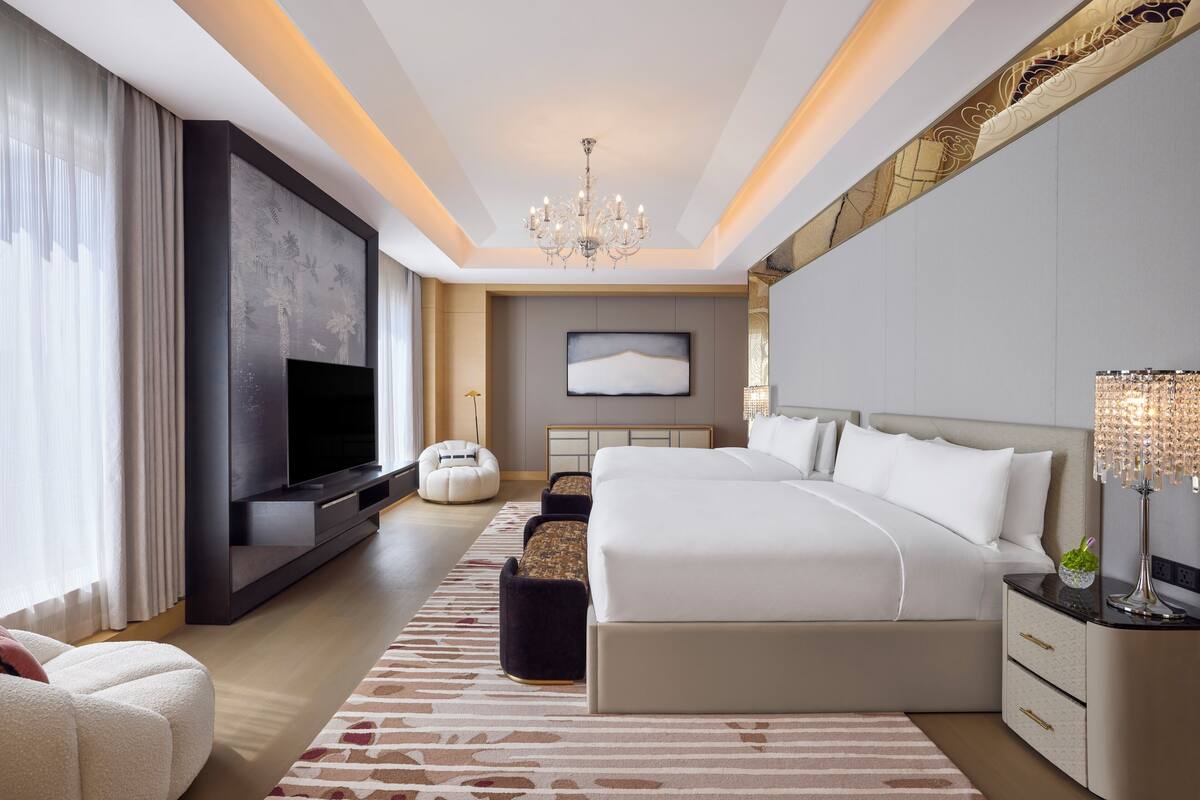 Premium bedding, down duvets, Select Comfort beds, minibar