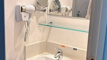 Shower, free toiletries, hair dryer, towels