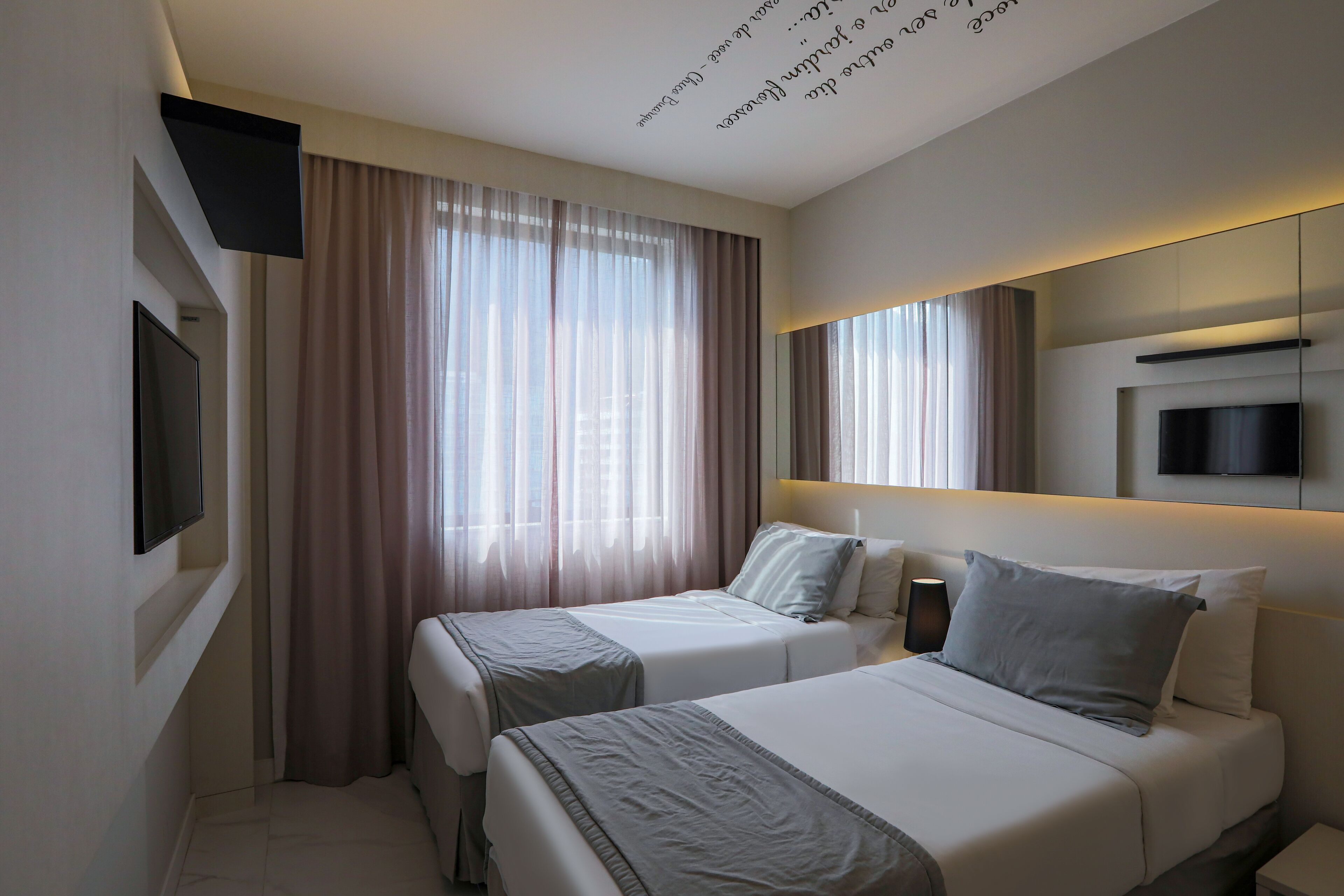 luxury room, 2 single beds | minibar, in-room safe, laptop workspace, iron/ironing board