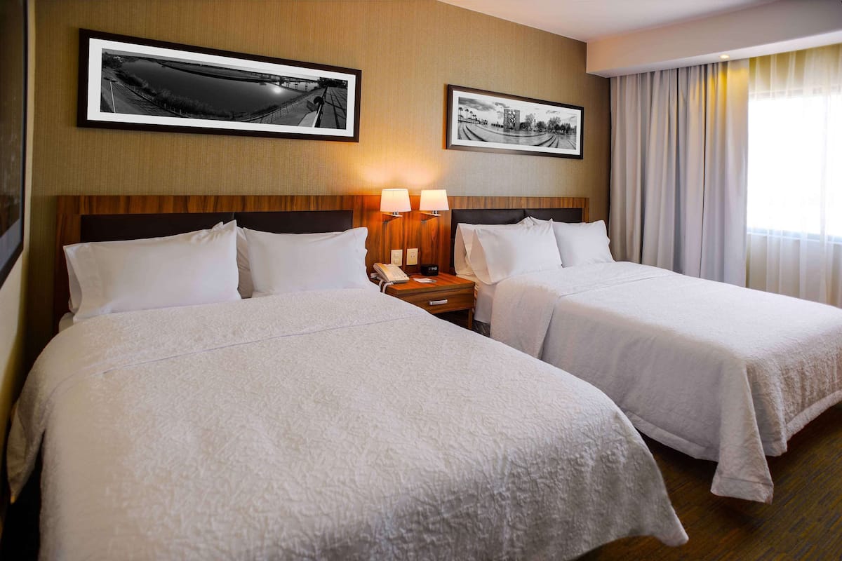 room, 2 queen beds, non smoking, refrigerator | in-room safe, desk, blackout curtains, soundproofing