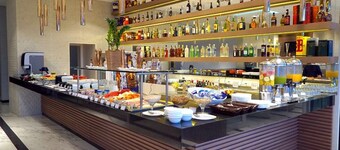 雷克里歐購物 e 套房飯店