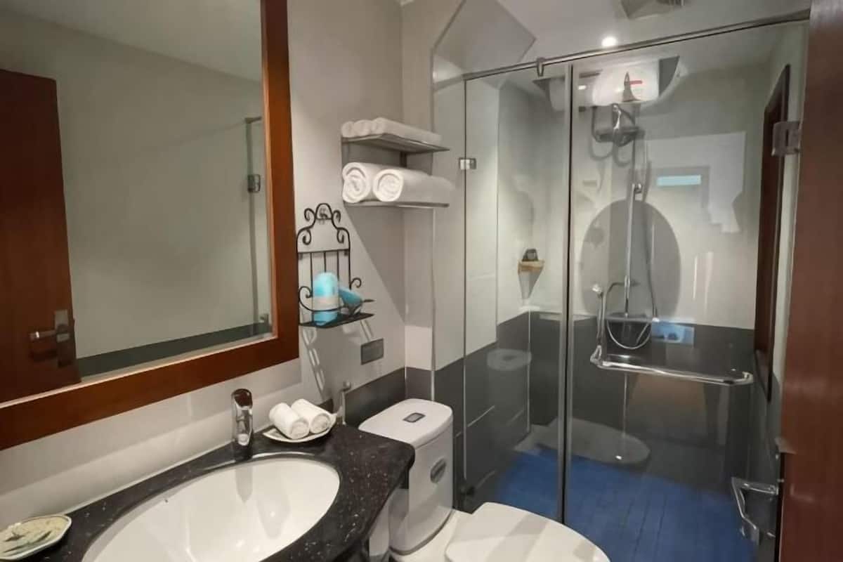 Bathroom | Shower, free toiletries, hair dryer, bathrobes