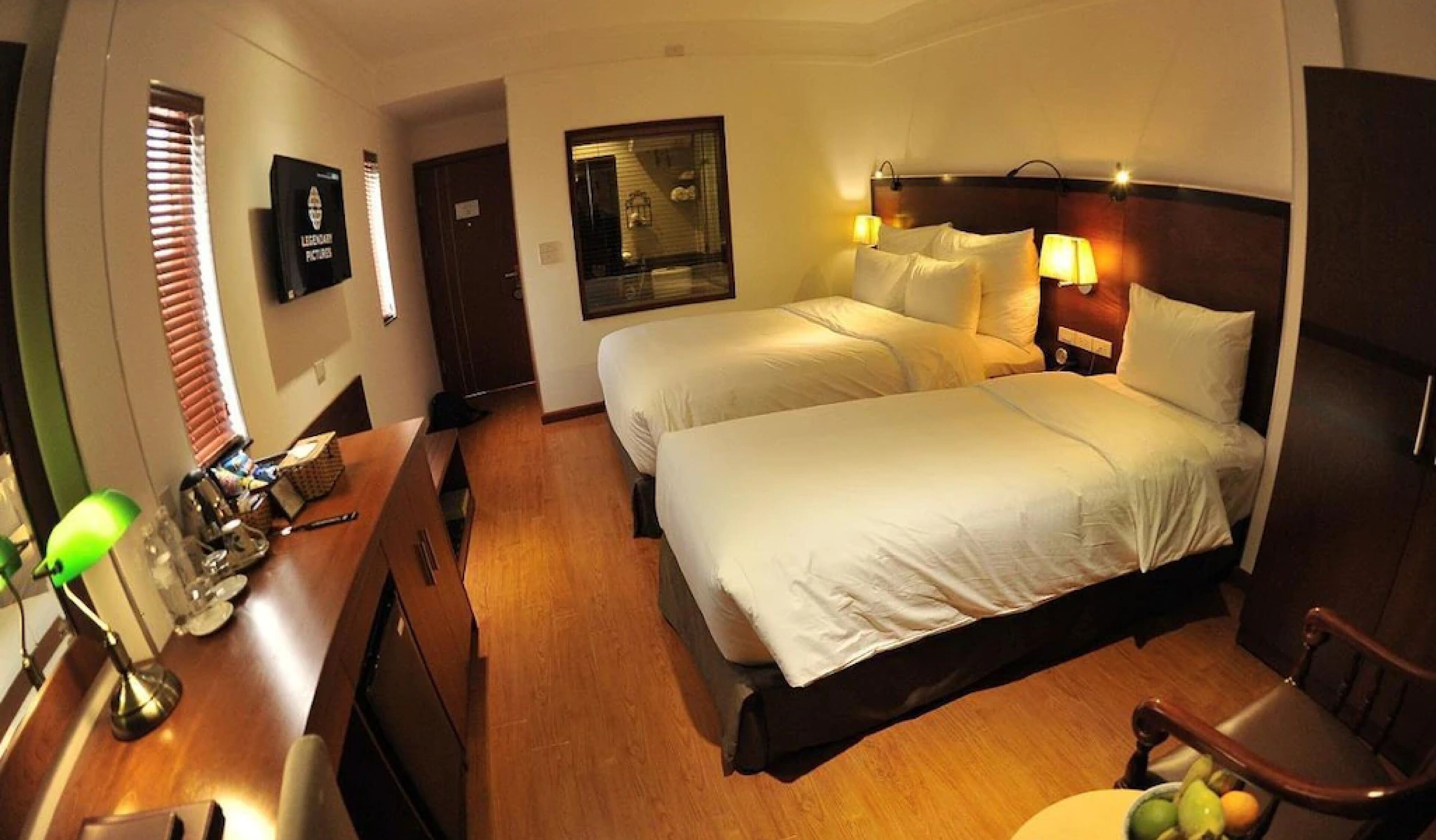 executive family room | minibar, in-room safe, individually decorated, desk