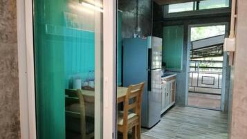 Fridge, electric kettle, cookware/dishes/utensils