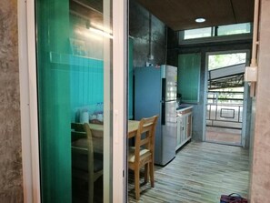 Fridge, electric kettle, cookware/dishes/utensils