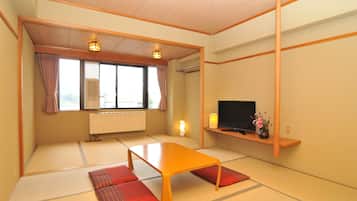 32-inch flat-screen TV with cable channels, TV