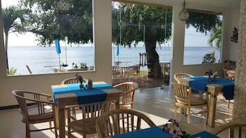 Breakfast, lunch, dinner served; local and international cuisine