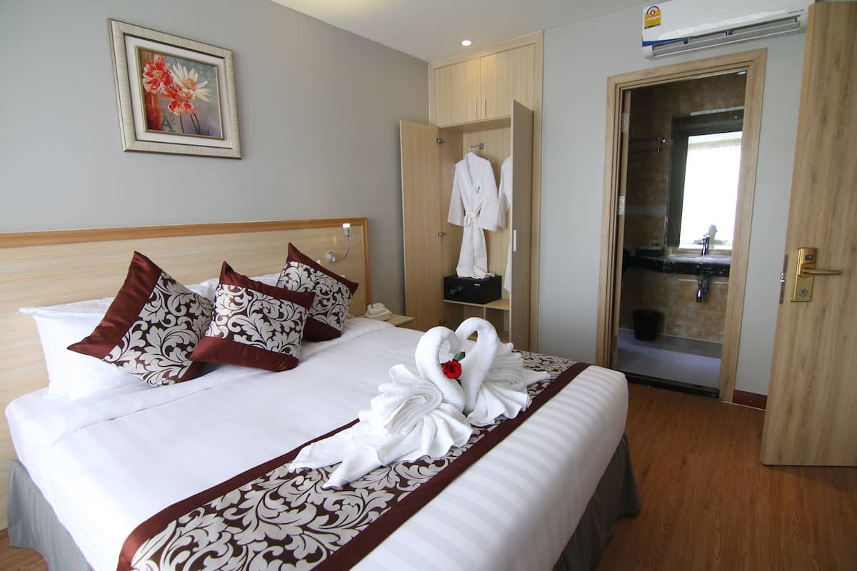 Deluxe Double Room, River View | Premium bedding, in-room safe, desk, laptop workspace