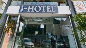 A hotel entrance with a glass facade, a sign reading "i-HOTEL", and a logo above the entrance. - i-Hotel Kuala Lumpur (Kuala Lumpur)