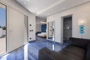 Suite | Premium bedding, down comforters, memory foam beds, minibar
