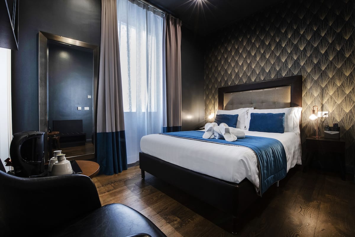 1 kamar tidur, seprai premium, selimut bulu angsa, dan minibar
