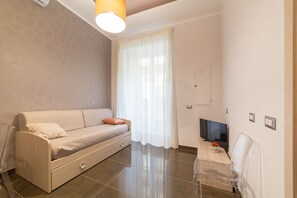 Superior Room | Living area | Flat-screen TV - Be Italian Bovio Flats (Naples)