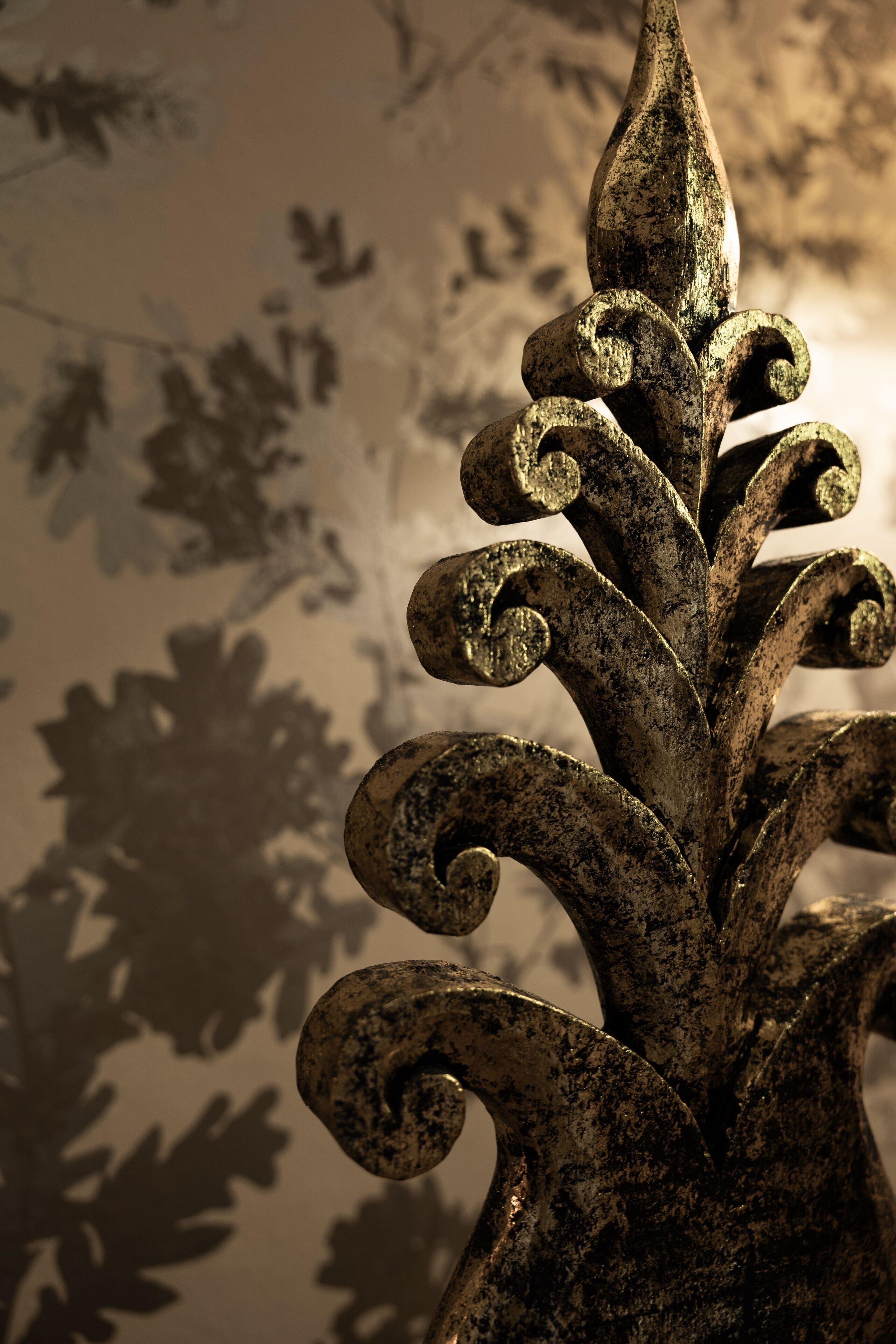 A close-up of a decorative ironwork with intricate scrollwork.
