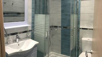 Shower, free toiletries, hair dryer, towels