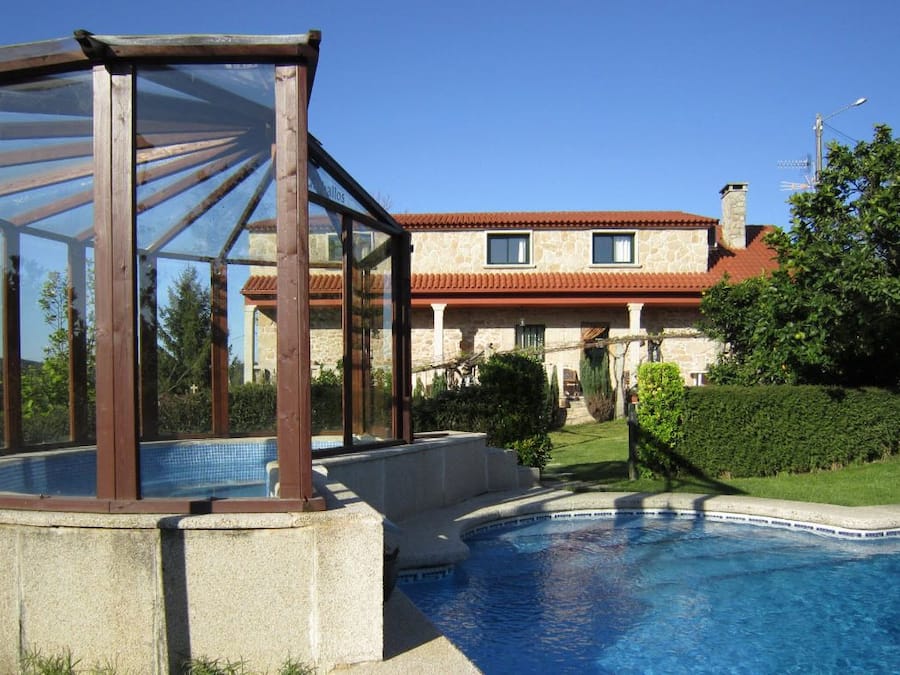 Outdoor pool, a waterfall pool, sun loungers