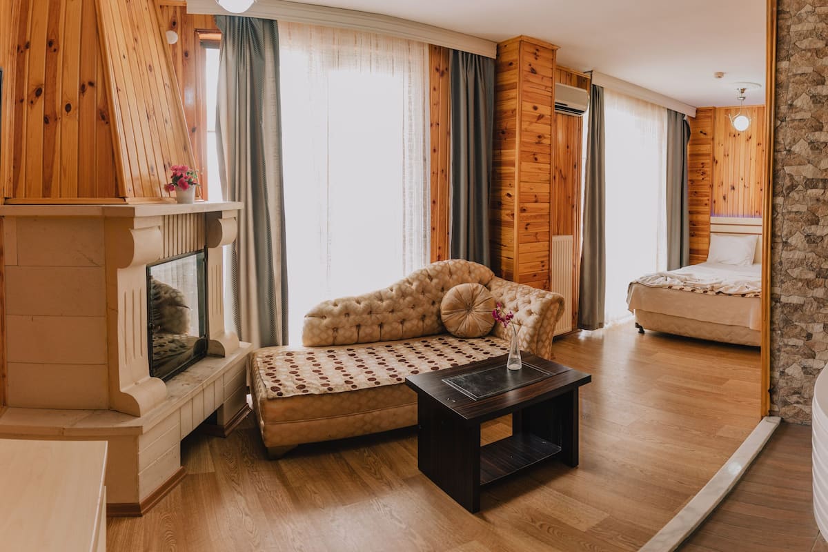 Genis Jakuzili Deluxe Suit | Individually decorated, individually furnished, blackout curtains
