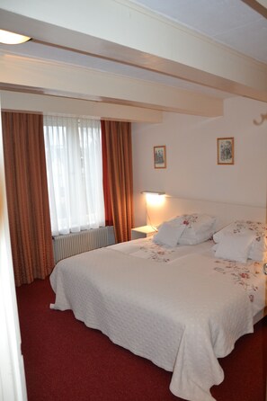 Blackout curtains, iron/ironing board, free cots/infant beds