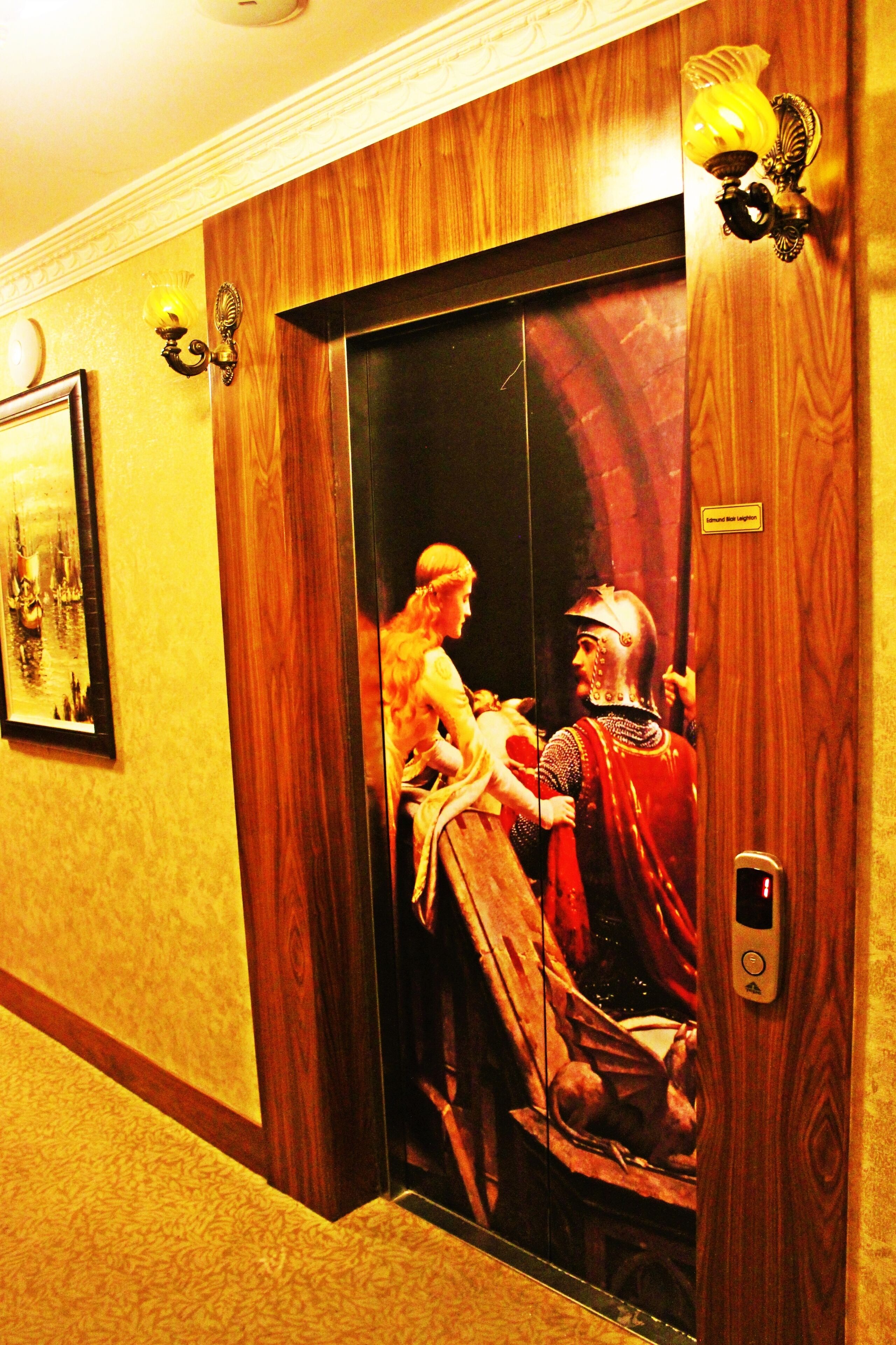 An elevator with a wooden interior and a vintage painting depicting a historical scene.