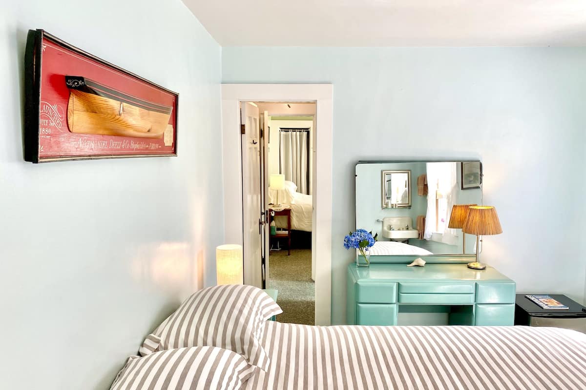2 Bedroom Suite, Queen w/Queen | Desk, blackout drapes, iron/ironing board (on request), WiFi (free)