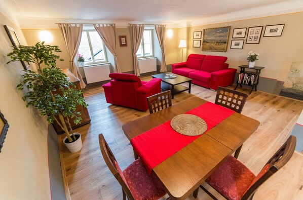 Apartment, 1 Bedroom (5 Adults) | Living room | 1-inch flat-screen TV with satellite channels, TV