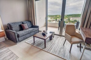 Minibar, in-room safe, desk, laptop workspace - Royalton Blue Waters Montego Bay, An Autograph Collection All Inclusive Resort (Falmouth)