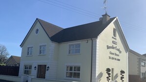 A two-story building with a sign reading "Brooke Lodge Guest House." - Brooke Lodge Guesthouse (Magherafelt)