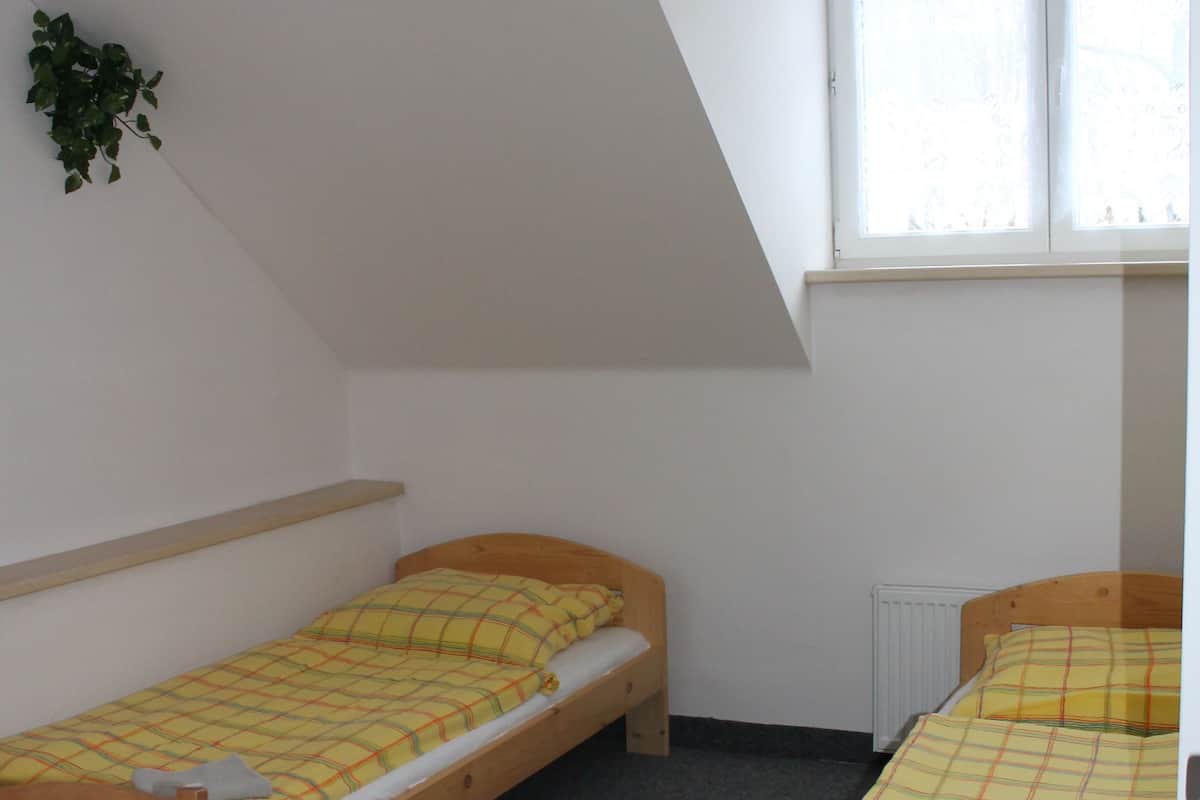 Triple Room, 1 Bedroom | Desk, free cots/infant beds, rollaway beds, free WiFi