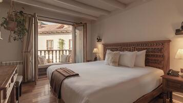 Habitación superior | Ropa de cama de alta calidad y edredón