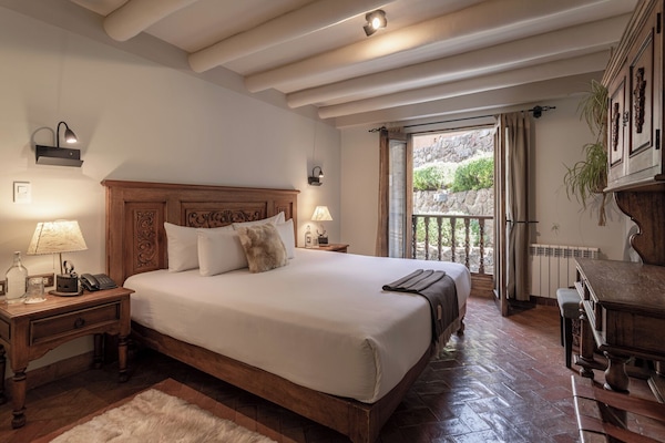 Premium bedding, down duvets, in-room safe, desk